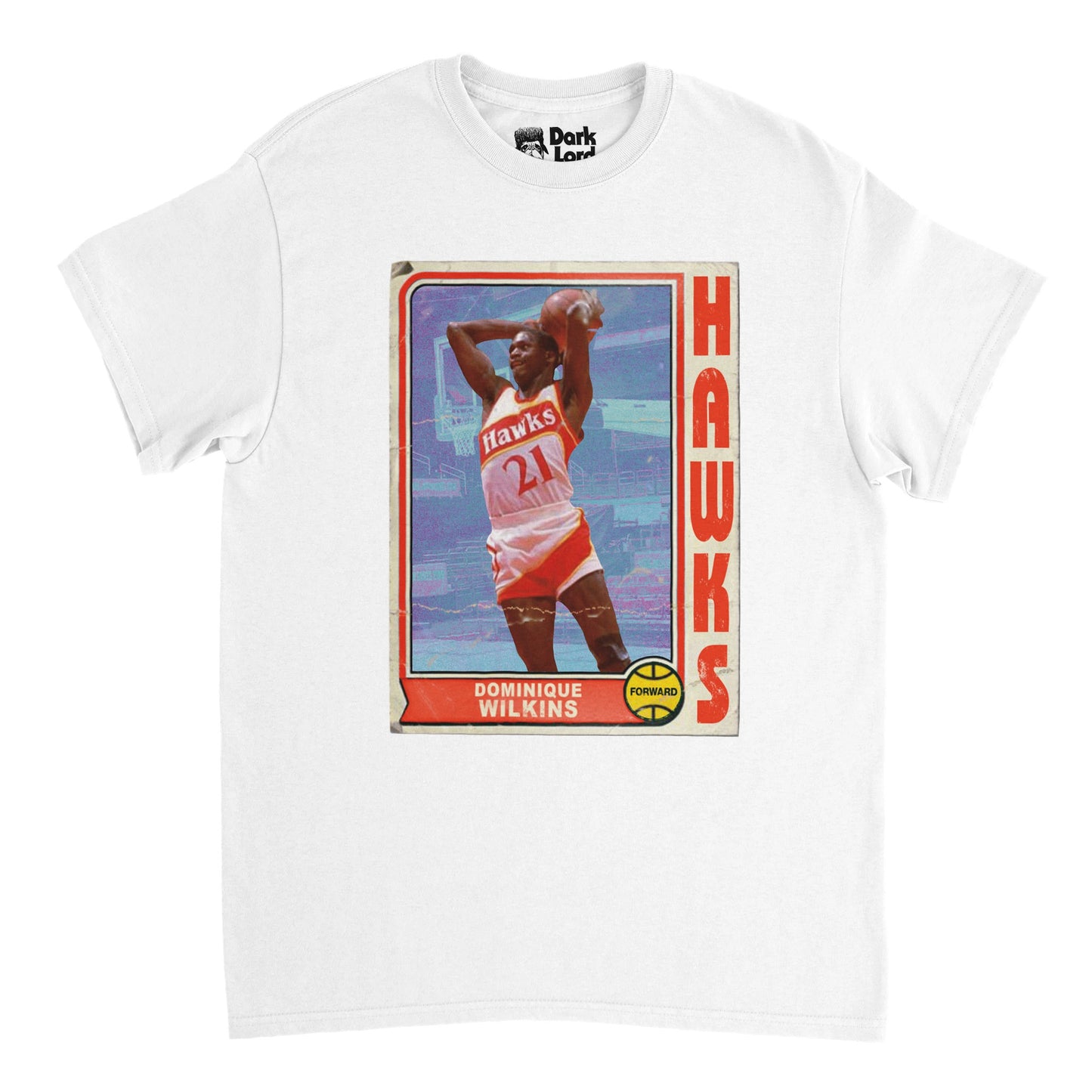 A white colored short sleeved retro t-shirt with a graphic picturing the famous basketball player Dominique Wilkins, a nine time NBA All Star, with an image of him shooting a basketball in his red and white Atlanta Hawks jersey with the number 21. Shirt says "Dominique Wilkins", "Forward" (his position), and "Hawks".