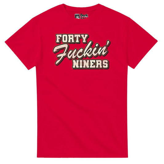 A retro, bright red 80s style t-shirt that says "Forty Fuckin' Niners" in bold bubble letters. References the iconic shirt quarterback Joe Montana (often considered one of the best quarterbacks of all time) wore in the 80s when he played on the San Francisco 49ers. 